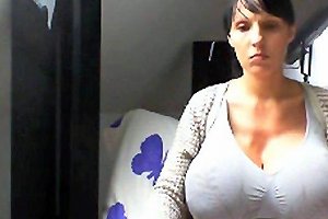 Hot Brunette Hiding Her Massive Boobs